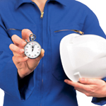 woman in blue work uniform holding a stopwatch and a helmet
