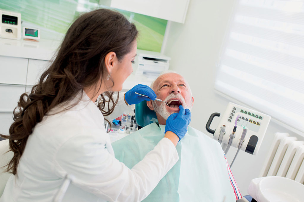 Senior man at the dentist